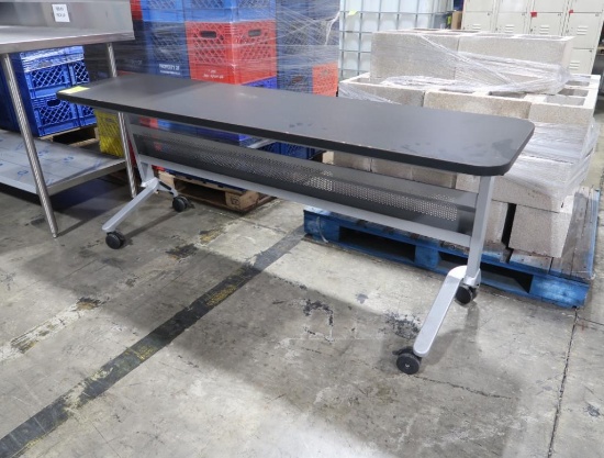 laminated table on casters w/ adjustable top