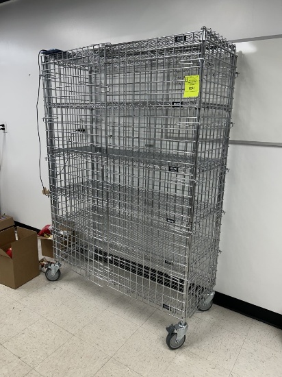 48IN X 18IN X 70IN ULINE RACK W/ DOORS ON CASTERS