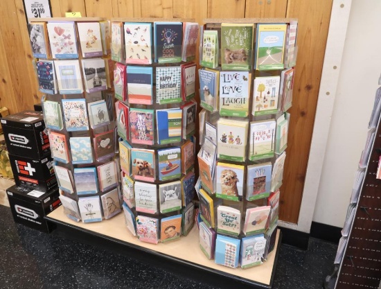 spinning card racks on riser