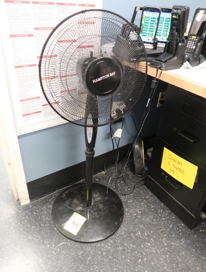Hampton Bay fan on a stand