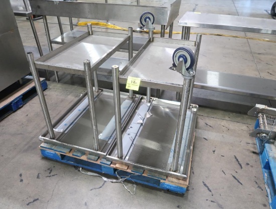 stainless tables, on casters, missing most casters