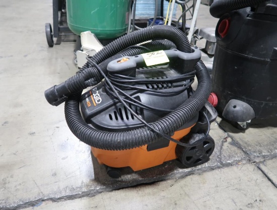 Rigid portable vacuum