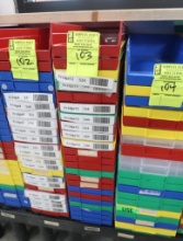 stack of plastic storage bins