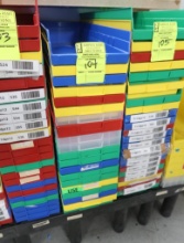 stack of plastic storage bins