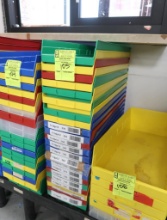 stack of plastic storage bins
