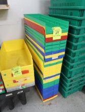 stack of plastic storage bins