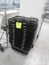 stack of shopping baskets w/ holder