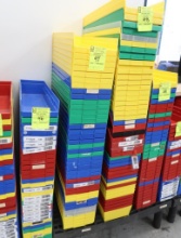 stack of plastic storage bins