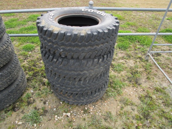 (4) Co-op Grip Spur Tires