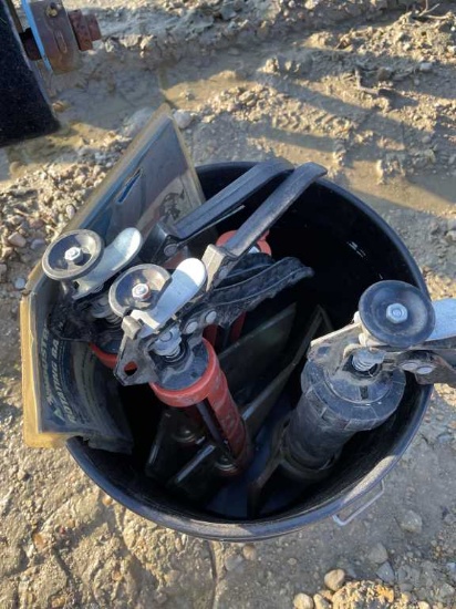 Bucket of Caulk Guns