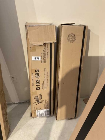 Two boxes of bed slats