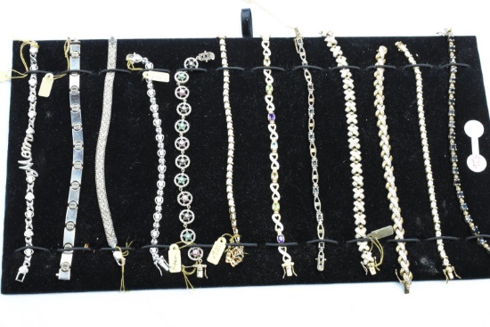 12 STERLING BRACELETS