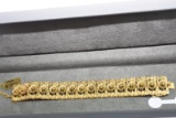 18KT BRACELET 63.5 GTW, $3900.00 RETAIL VALUE,