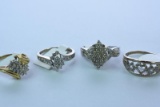 4- 10KT GOLD  & DIAMOND RINGS 10 GTW, $1200.00 RETAIL VALUE