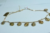 14 KT NECKLACE WITH 9 10 KT VARIOUS COCA COLA SERVICE CHARMS, 26 GTW, $895.00 RETAIL VALUE