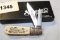 SCHRADE SCRIMSHAW DOG & DUG KNIFE IN BOX