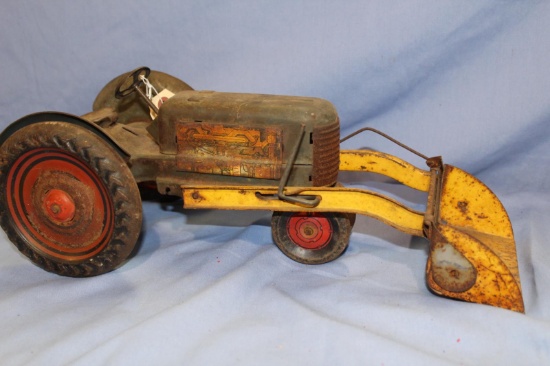 UNKNOWN MAKER STAMPED MEDAL TRACTOR, 16 IN LONG