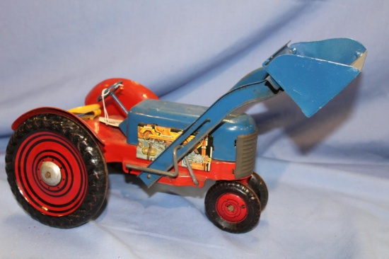 UNKNOWN MAKER STAMPED MEDAL TRACTOR, 16 IN LONG