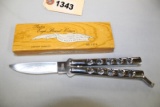PARKER CUT TO GYPSY KNIFE IN BOX