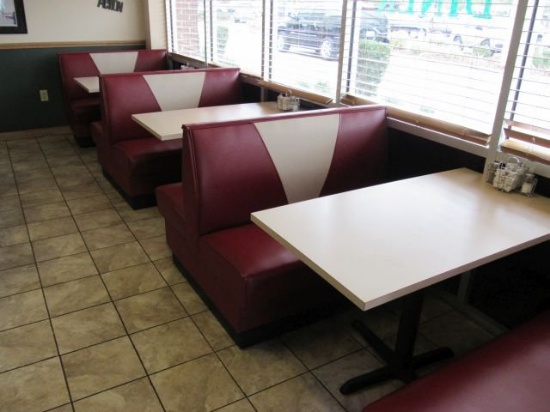 red and white upholstered booths