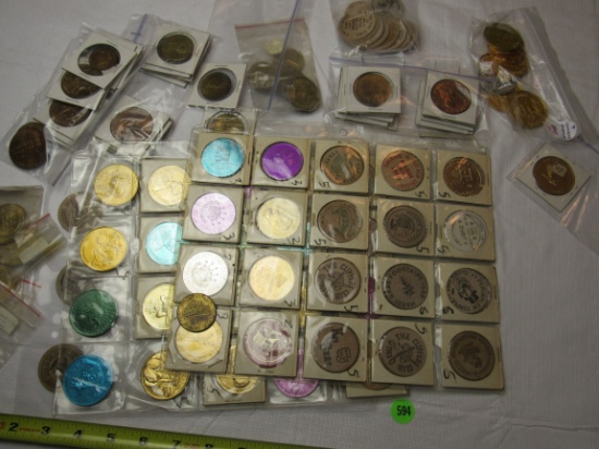 Collection of over 100 tokens, wood, brass, and aluminum some jacketed