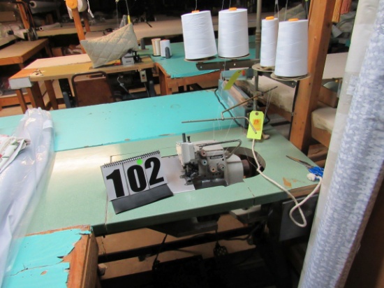 4 spool Brothers Serger machine with table