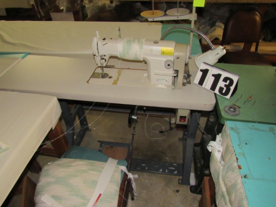 single needle Juki sewing machine with table 220v 3 ph