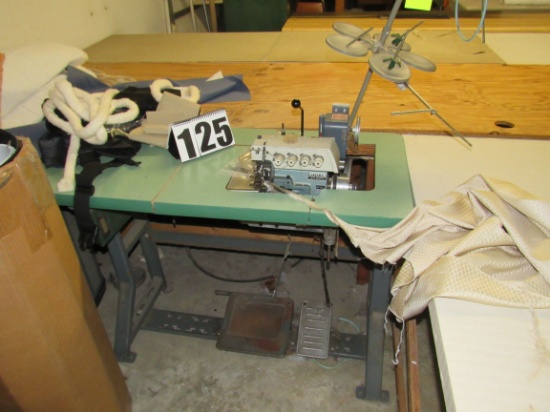 4 spool juki serger with puller and table
