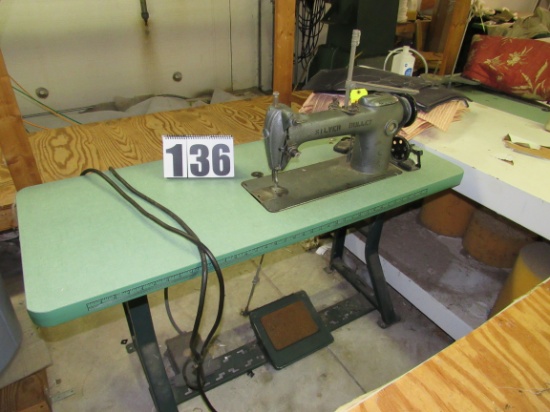 straight needle sewing machine with table