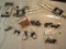assortment of Gessele new gun accessory parts including pins, trigger controls, trigger spring kits,