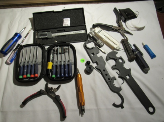 Mixed tools including screwdriver sets, scales, micrometer, multi wrench, reamers, needle nose rever