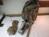 Coyote calling kit includes fake rabbit on a stand, electronic caller, camo backpack carry bag