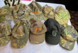 collection of camo hunting caps - mostly advertising