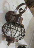 Designers Fountain outdoor wall sconce rusty brown finish seeded glass lense packaging rough product