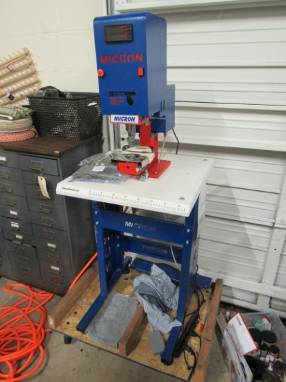 pneumatic grommet press, comes on a dolly , plujssnaps