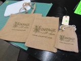 Mixed sized burlap tote bags.  These bags come in three different sizes and have already been printe