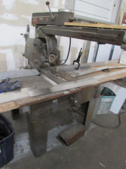 Delta 16" radial saw with 30' feed bench