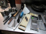 mixed kitchen utensils includes can opener, grater, cheese slicer)