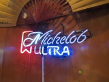Michalob Ultra beer sign (note neon tubes light by partially dim)