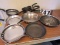 group of mixed size fry pans