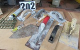 group of trowels for cement,  mortar, and tile applications