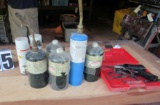 group of propane torches, soldering gun and refill Coleman propane bottles
