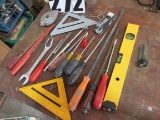 mixed tools including screw drivers, marking squares, level, corner square, air gauge, chalk marker,