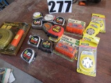 tape measure collection of 9  tapes, new siphon pump kit, Stanley quick draw magnetic tape holders,