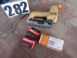 Swingline brad nailer with boxes of brads.  This tool is great for running moldings and trim.
