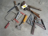 group of mixed tools, knives, hammers, coping saw, and more