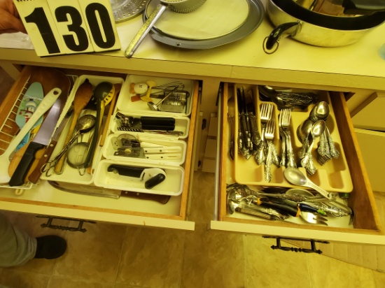 mixed cooking utensils and flatware