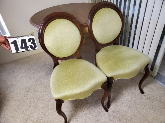 French Provincial brown wood frame dining chairs with upholstered backs and seat bottoms