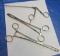 group of 3  stainless steel surgical tools forceps