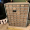 small parts bins with small screws and other hardware
